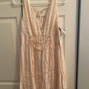 Pink and white vertical striped dress.